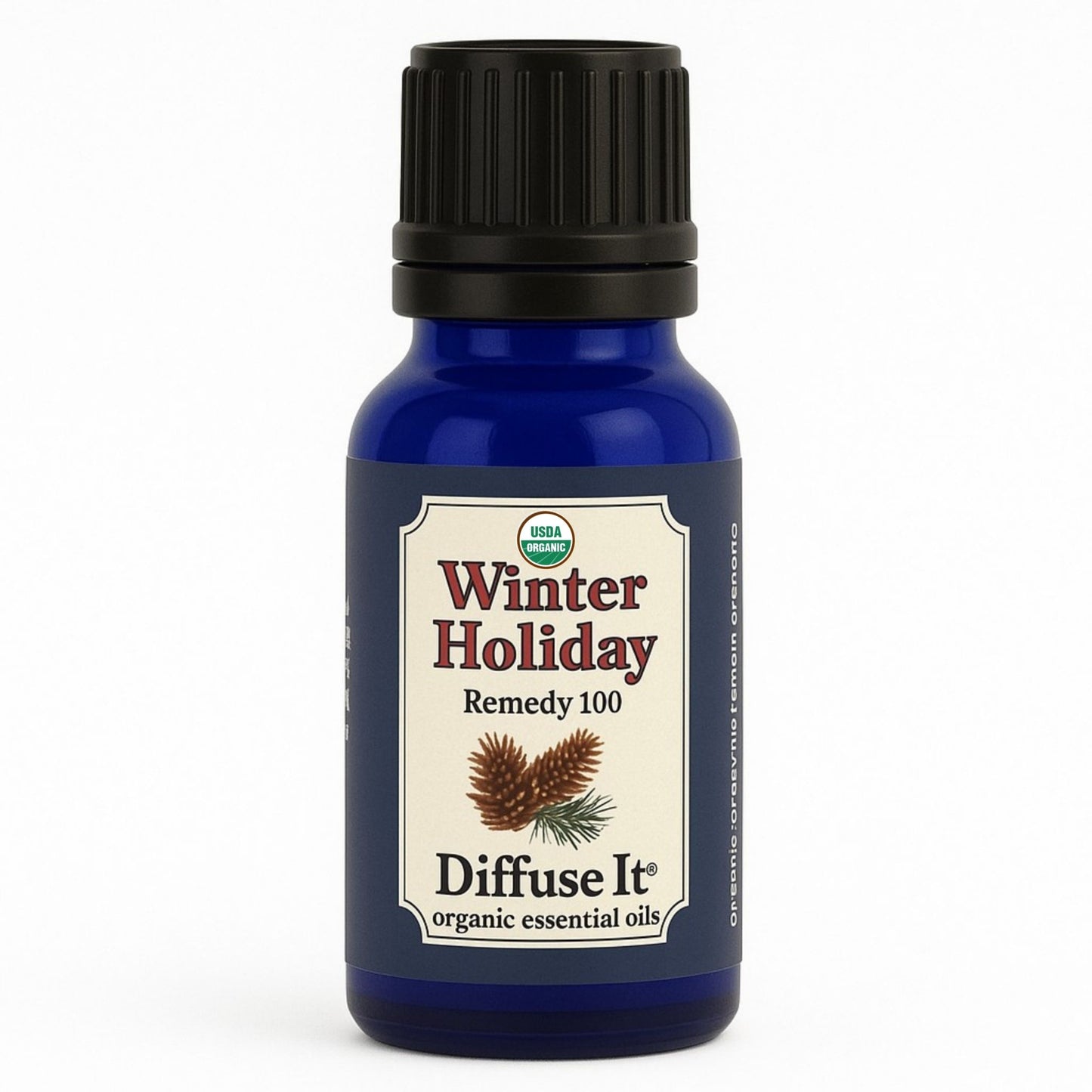 Cobalt blue 15 mL bottle of Diffuse It® Winter Holiday essential oil by Essential for Wellness