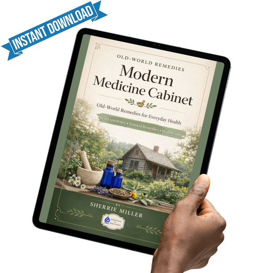 Hand holding a tablet displaying the cover of 'Modern Medicine Cabinet' by Sherrie Miller with a scenic background.
