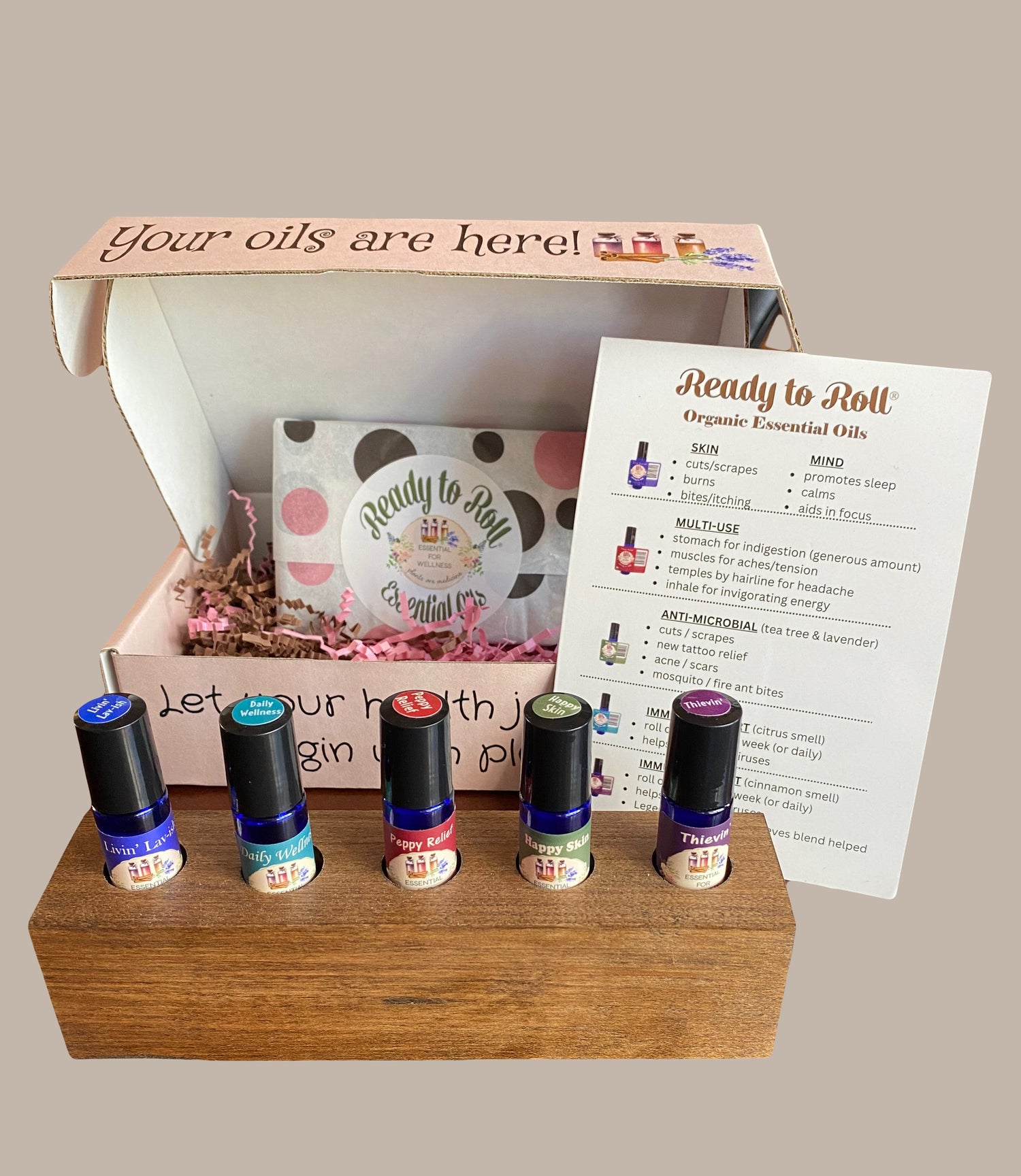 Five Ready to Roll Essential Oil Blends in a handmade wooden holder with how-to-use magnet and decorative gift box
