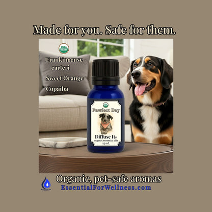 Bottle of 'Perfect Day' diffuser oil with a dog in the background on a wooden table.