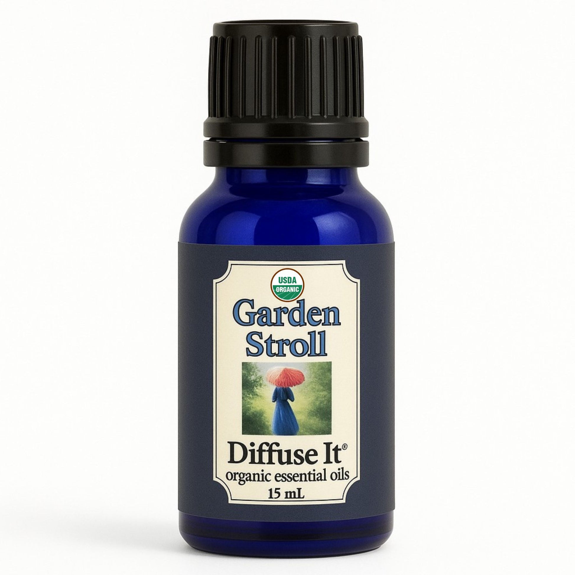 Cobalt blue 15 mL bottle of Diffuse It® Organic Garden Stroll essential oil blend with organic sweet orange, ylang ylang, lemongrass, and geranium essential oils by Essential for Wellness