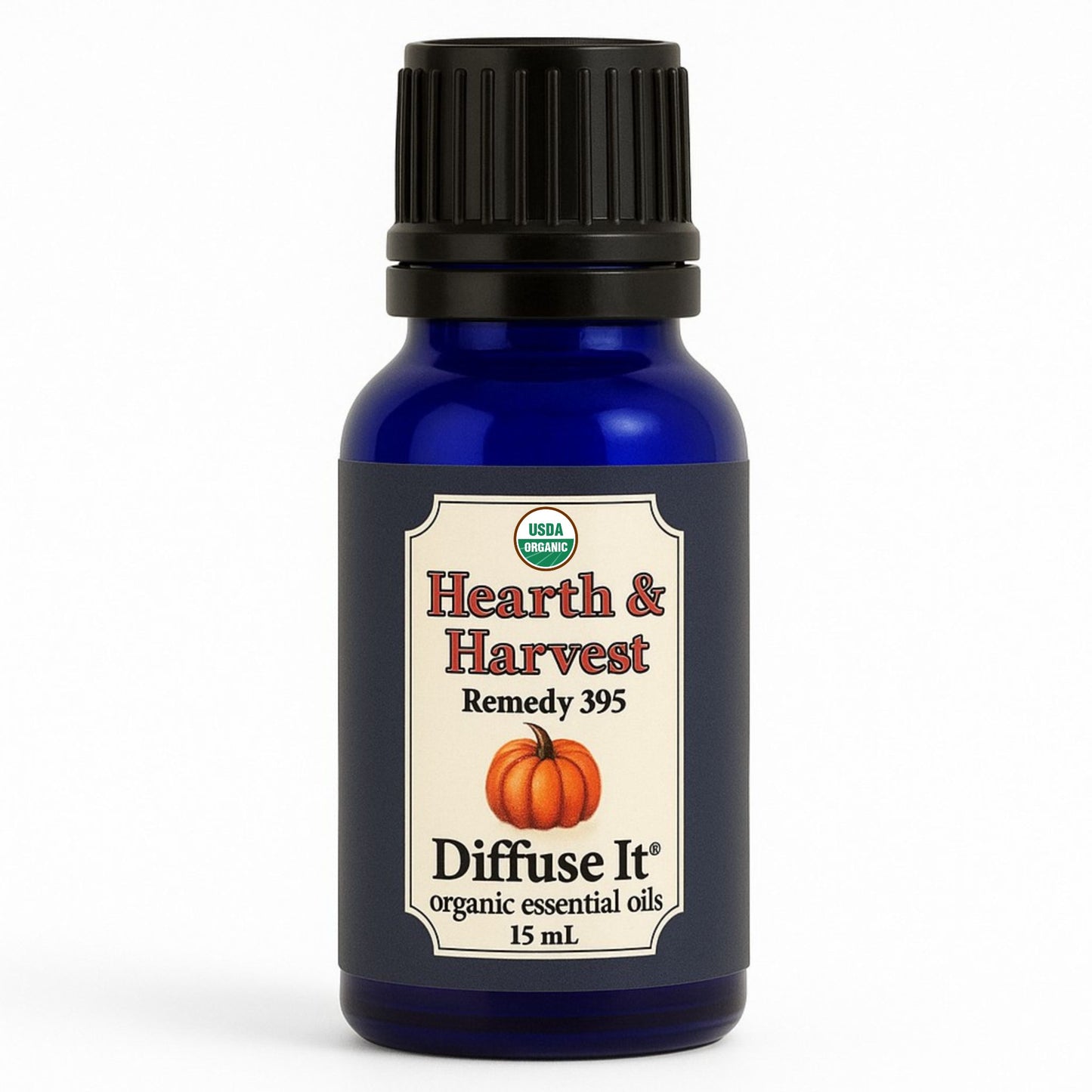 Cobalt blue 15 mL bottle of Diffuse It® Organic Hearth & Harvest essential oil blend with organic cinnamon, clove, nutmeg, ginger, sweet orange, and vanilla infusion by Essential for Wellness Organic Essential Oils