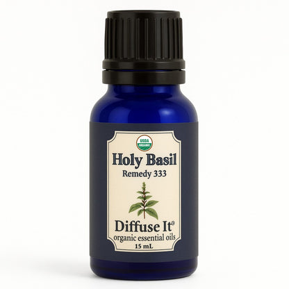 Cobalt blue 15 mL bottle of Diffuse It® Organic Holy Basil essential oil by Essential for Wellness Organic Essential Oils
