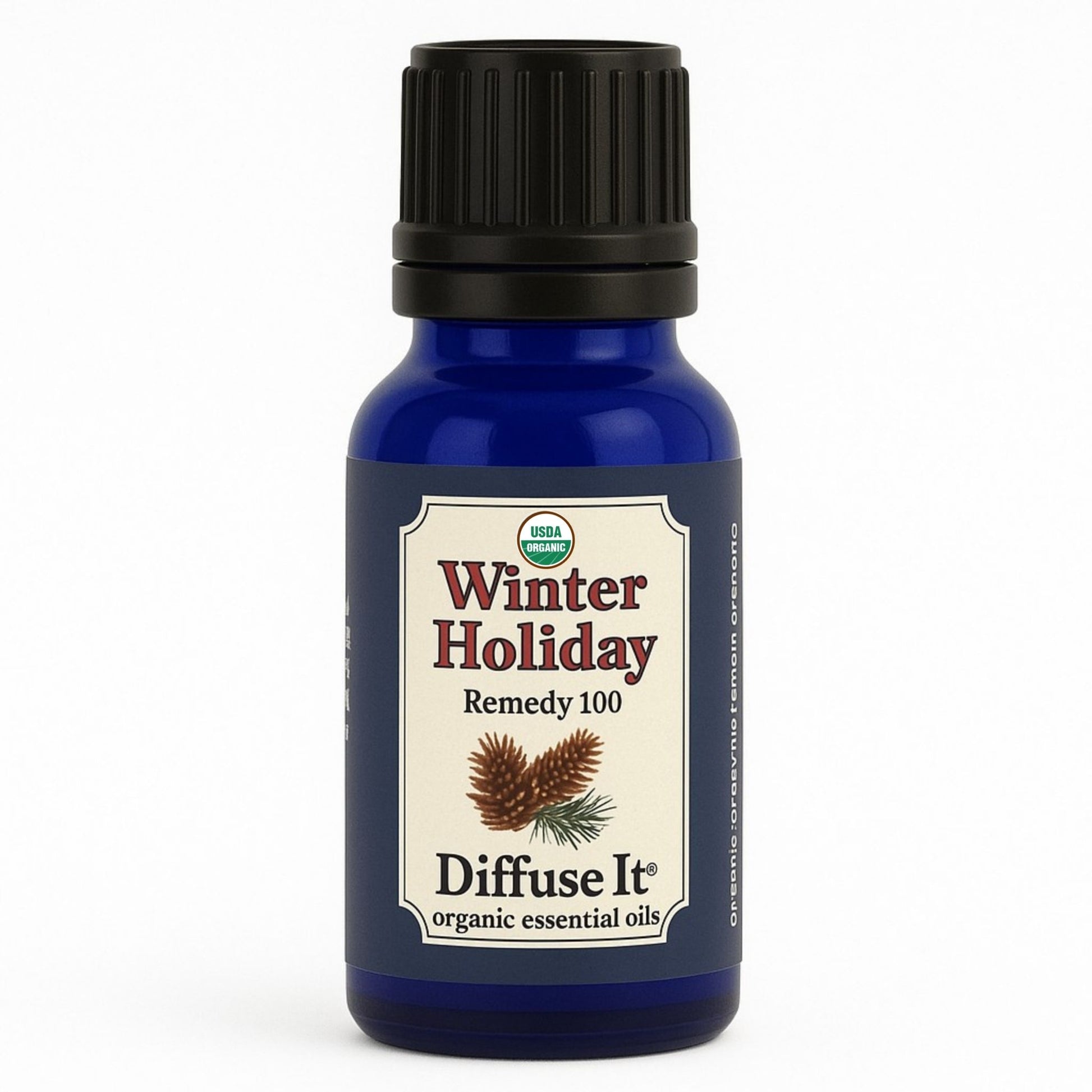 Cobalt blue 15 mL bottle of Diffuse It® Winter Holiday essential oil by Essential for Wellness