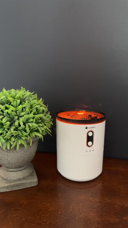 Video of Volcano Diffuser by Essential for Wellness in action with orange and blue light or no light at all.