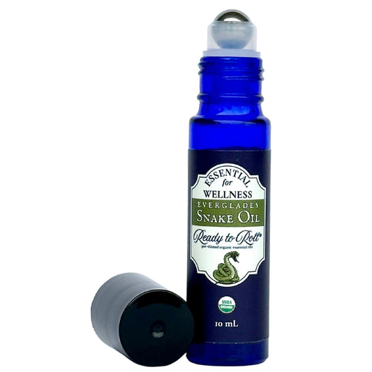 Everglades Snake Oil by Ready to Roll® – apothecary-inspired blend with organic sweet orange, frankincense, cypress, holy basil, and myrrh in a cobalt blue bottle